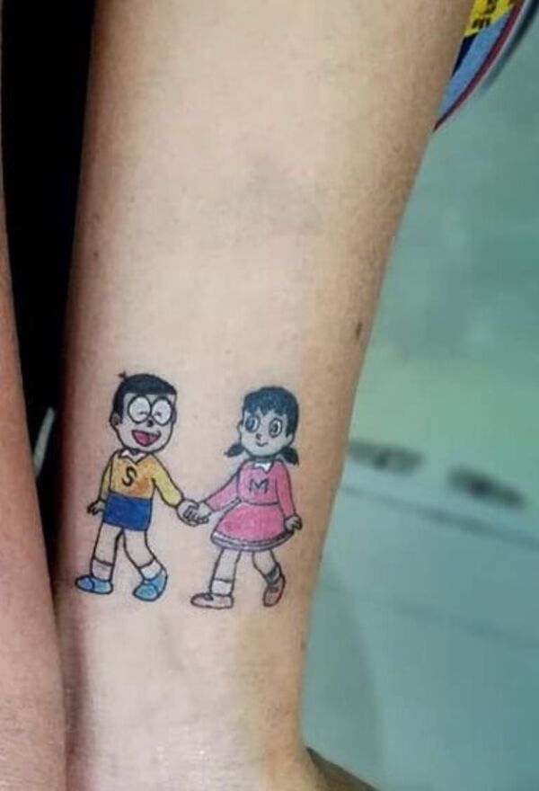 hình xăm nobita và xuka