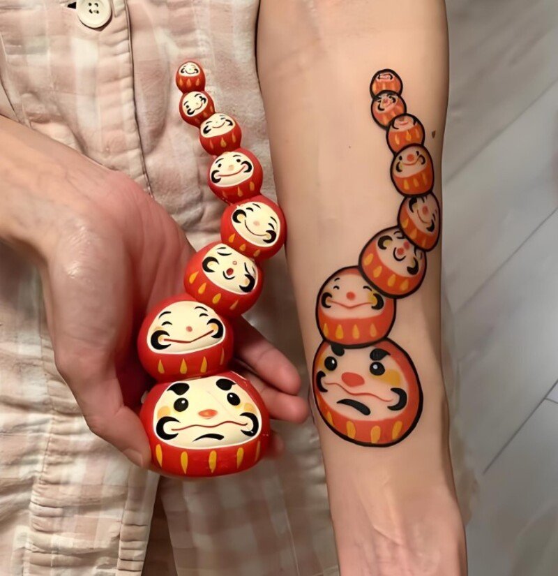 hình xăm 8 daruma cho nữ