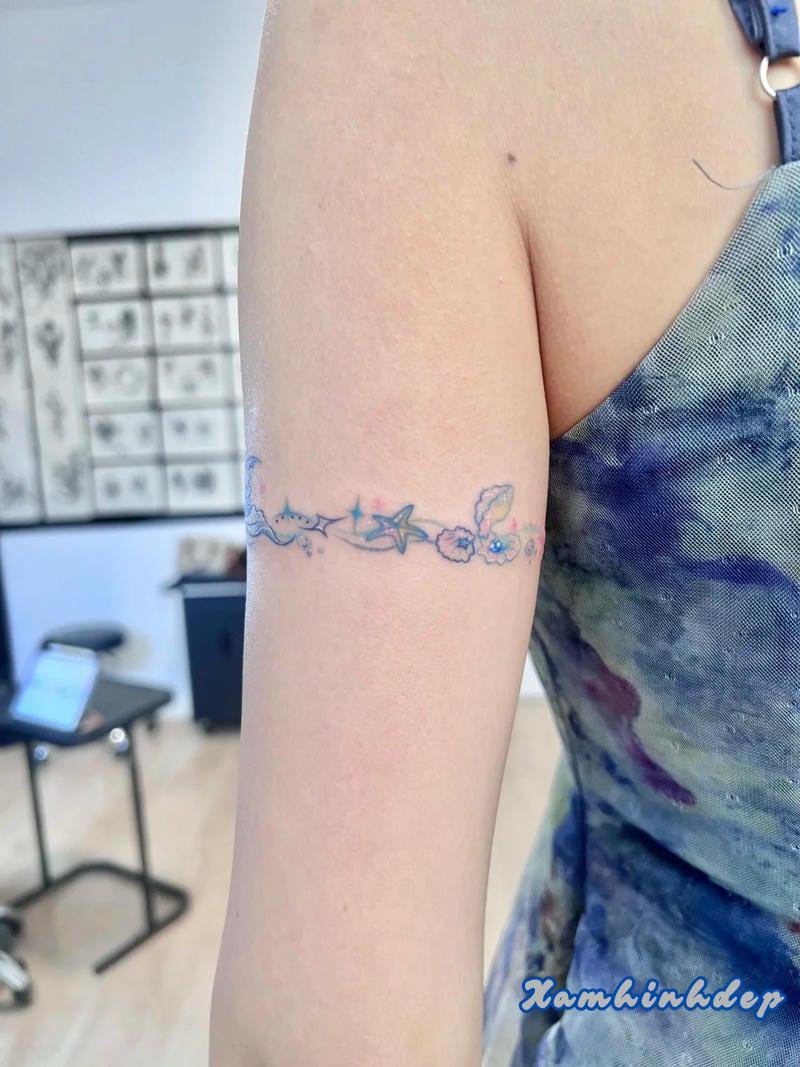 hình xăm bắp tay nữ mang nét đẹp cá tính.