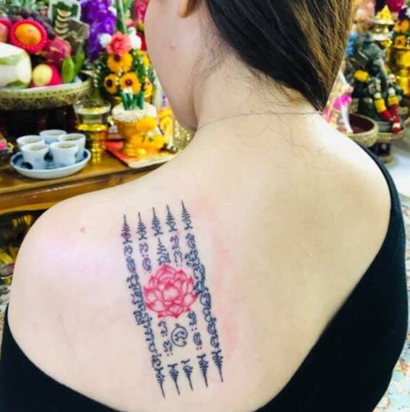 hình xăm bùa thái may mắn cho nữ