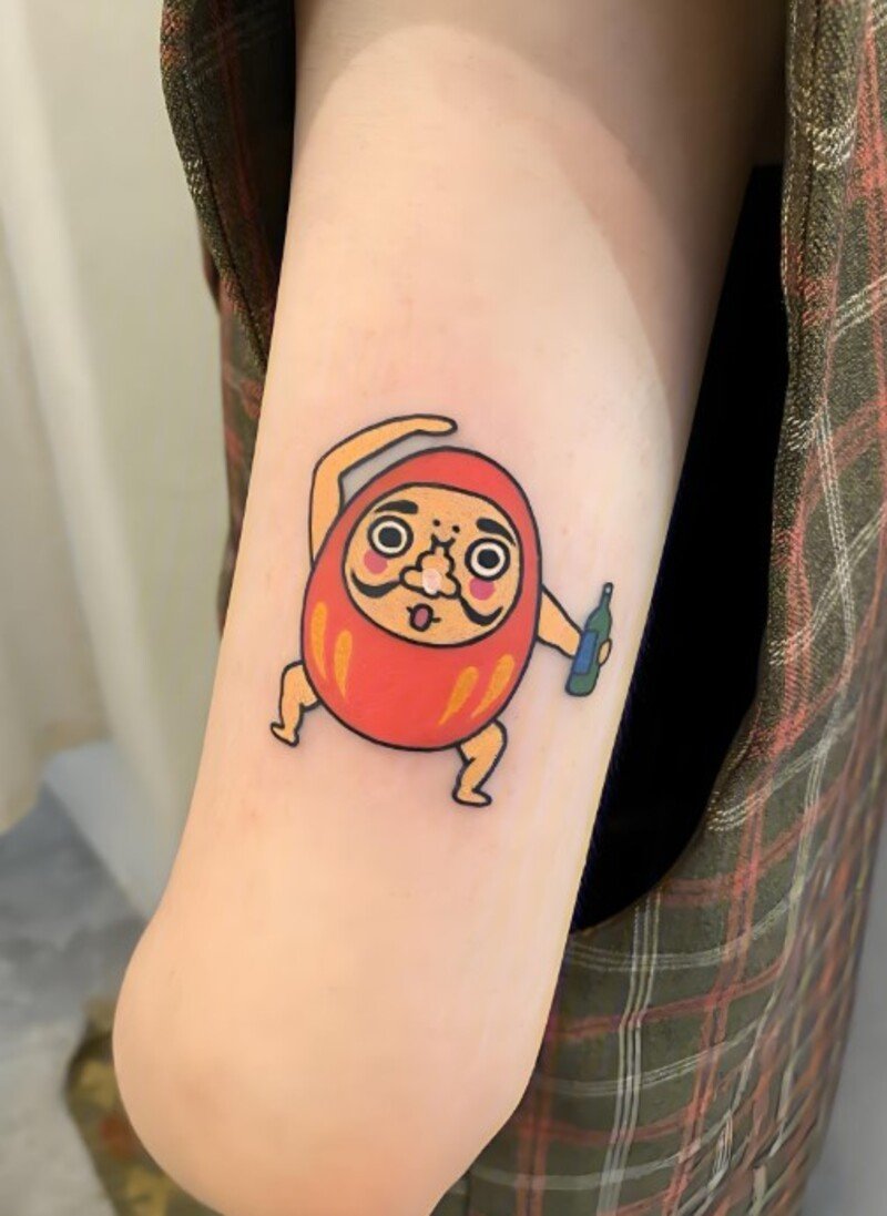 hình xăm daruma cho nữ cute