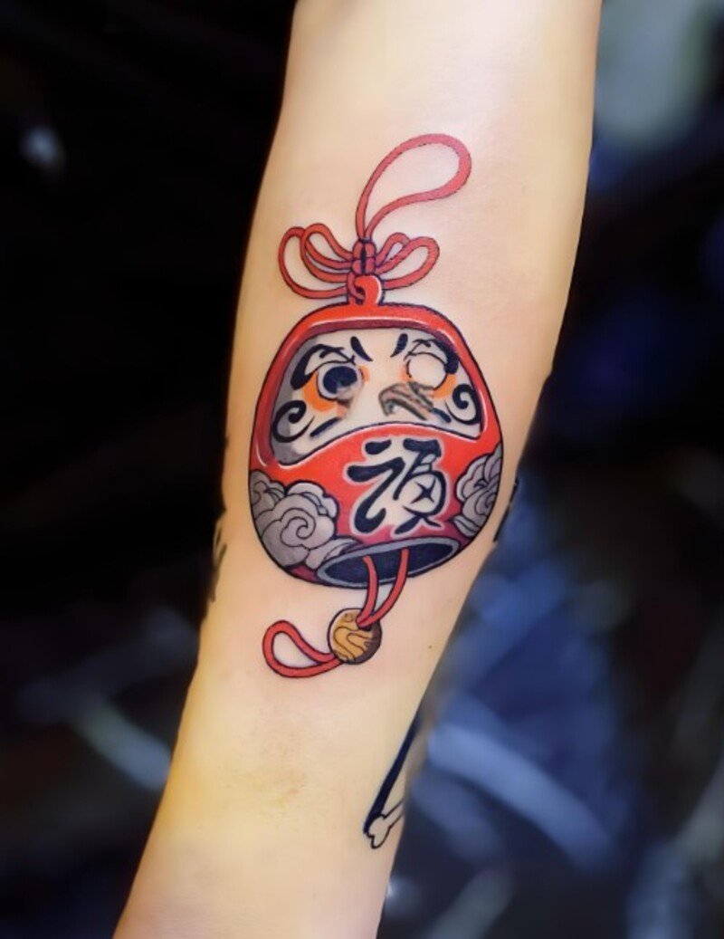 hình xăm daruma mini cho nữ