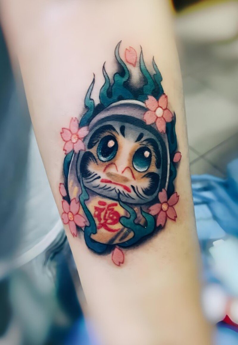 hình xăm daruma nhỏ cho nữ