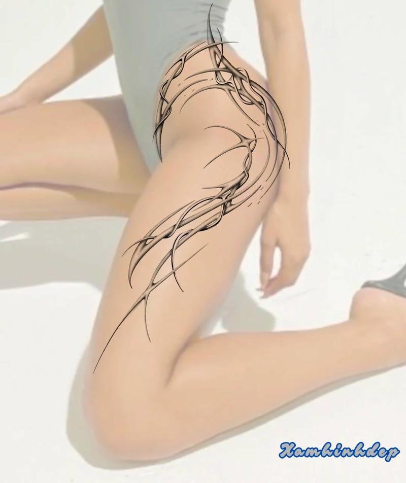 hình xăm đùi đẹp độc đáo.