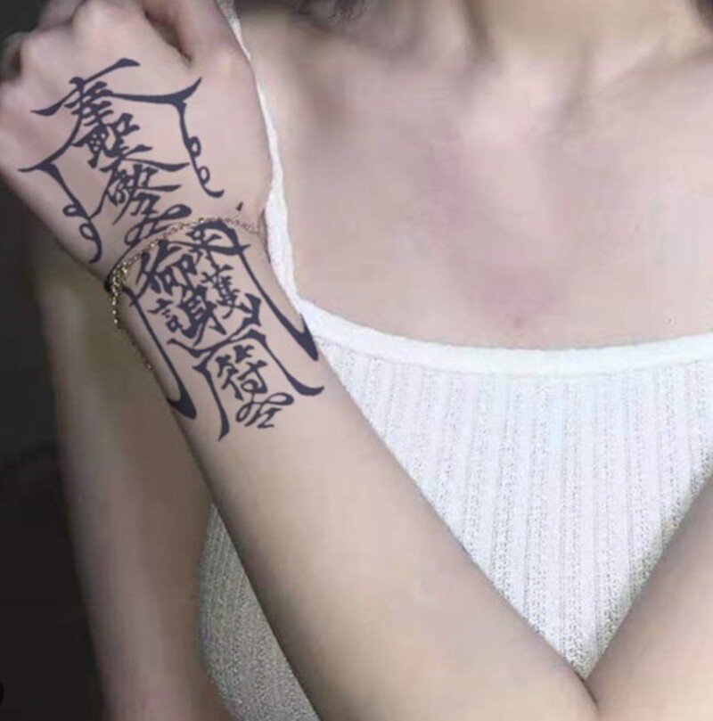 hình xăm linh phù may mắn cho nữ