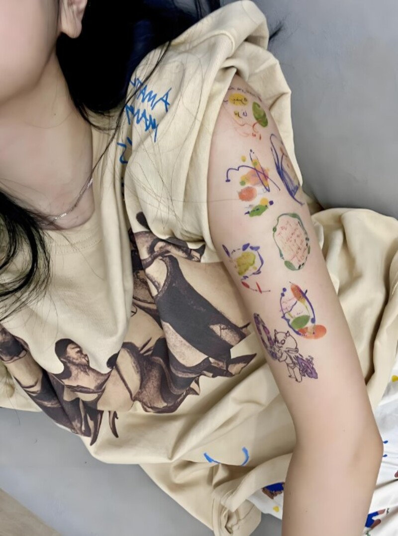hình xăm nhỏ ở bắp tay cho nữ