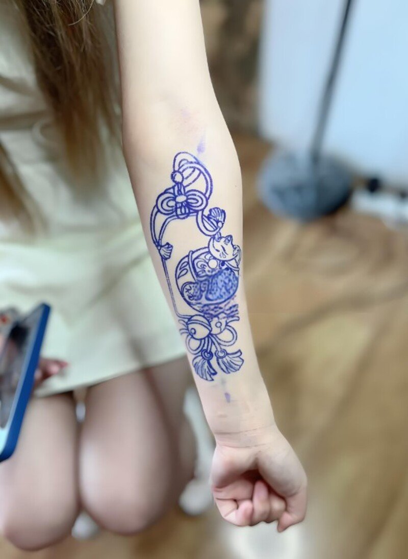 mẫu hình xăm daruma cho nữ