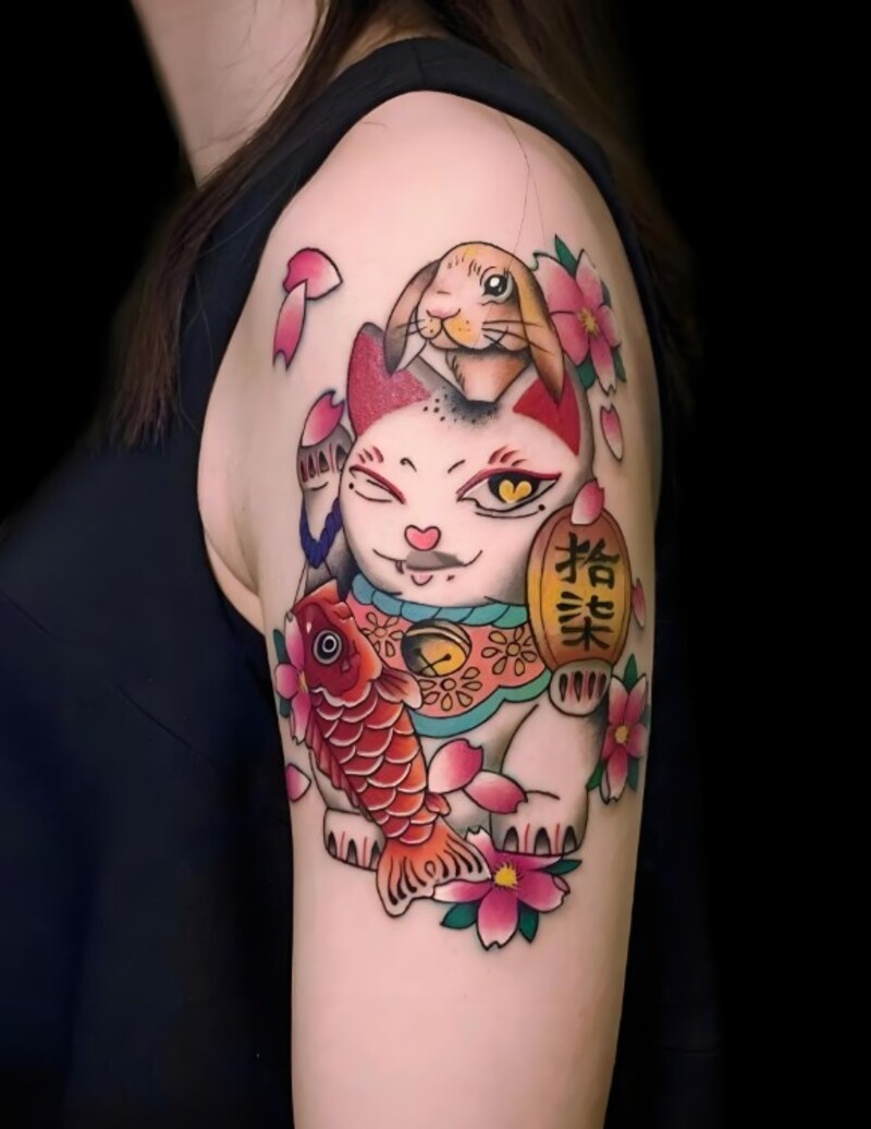 tattoo mèo thần tài ở tay cho nữ